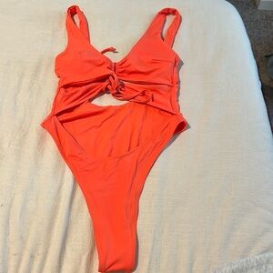 Bright orange one piece